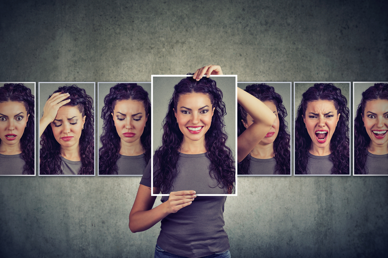 Collage of a woman displaying varied facial expressions, with the center frame emphasized by a white border.